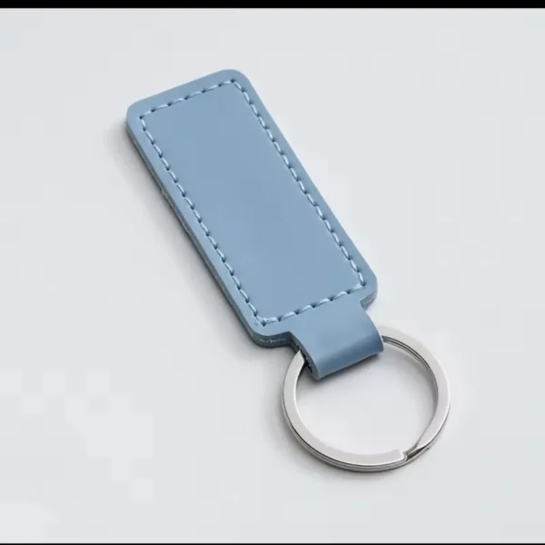 laser-engraved-leather-keyholder-rectangular-shape-light-blue Light Blue leather key fob with a silver split ring
