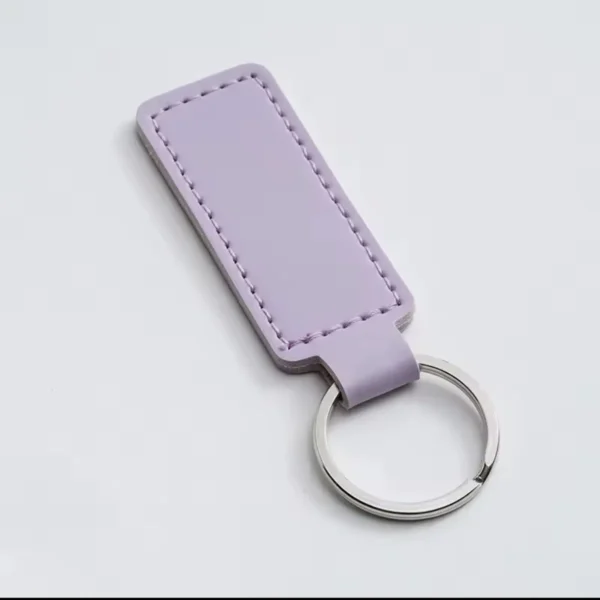 laser-engraved-leather-keyholder-rectangular-shape-lilac Lilac rectangular keyring tag with stitched edges and a silver metal ring