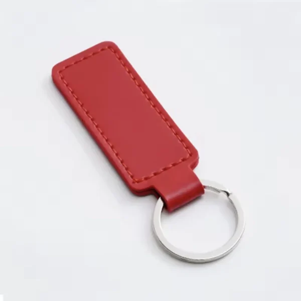 laser-engraved-leather-keyholder-rectangular-shape-red Red leather keyring with a stitched rectangular tab and silver metal ring