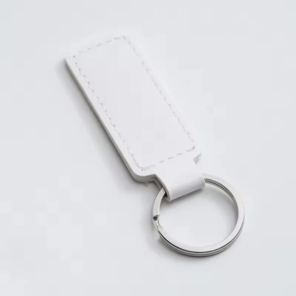 laser-engraved-leather-keyholder-rectangular-shape-white White rectangular keyring tag with a metal ring