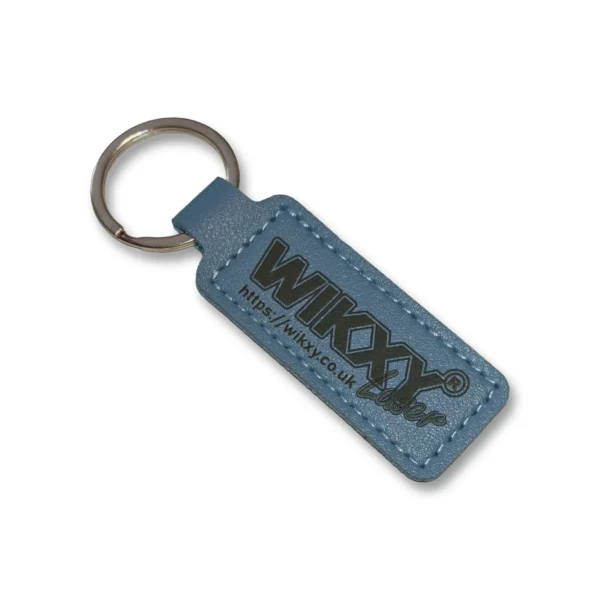 laser-engraved-leather-rectangular-keyholder-navy-blue Navy Blue leather keyring with a metal ring, embossed logo and website address